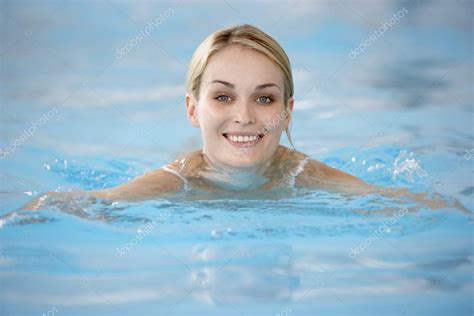 Young Woman Swimming In Pool — Stock Photo © Monkeybusiness 4796666