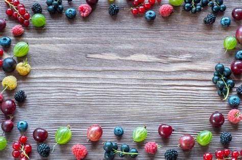 Berries On Wooden Background Summer Or Spring Organic Berry Ove Stock