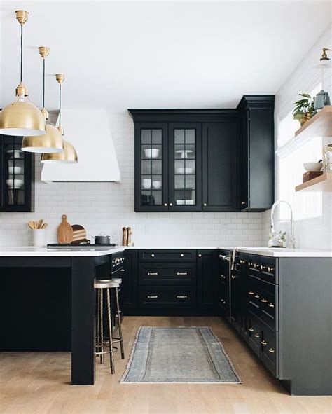 Custom cabinets are built in dimensions specific to your kitchen and have almost unlimited. Tuxedo Kitchen by @redesignhomellc #kitchendesign #blackandwhite #brasslighting #ki… (With ...
