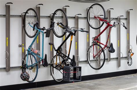 Create Vertical Bike Storage With These Vertical Bike Parking Systems