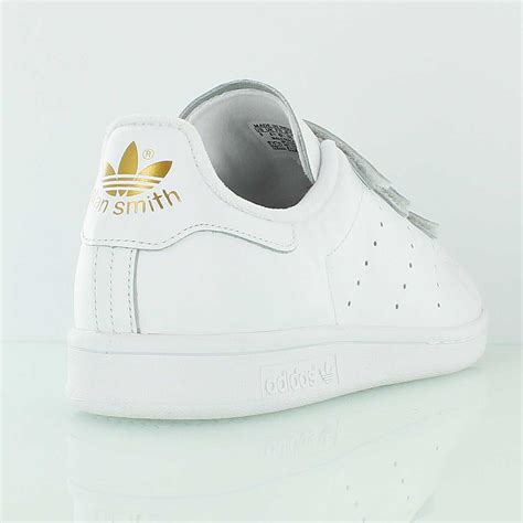 Je veux trouver des belles sneakers femme de marque pas cher ici adidas stan smith scratch femme serpent. adidas stan smith or femme