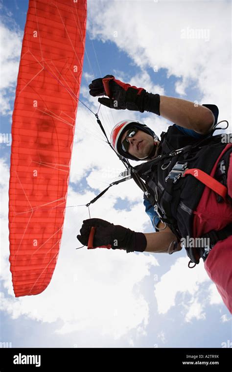 Male Parachutist With Red Parachute Stock Photo Alamy