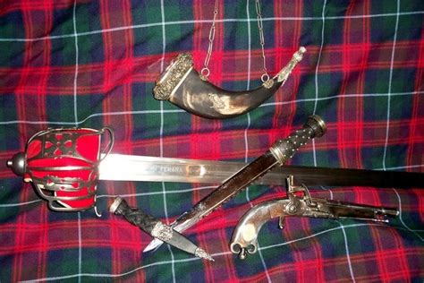 Traditional Scottish weapons consisting of a broadsword, dirk, sgian