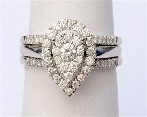 Are you the type who hasn't fallen for the 1930's wedding ring marketing ploy proclaiming: 14kt White Gold Pear Shape Diamonds Ring Set Bridal ...