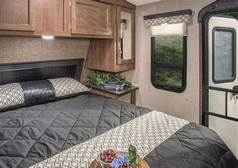 You see, this is the smallest true two bedroom travel trailer we've ever seen. 2016 Spree 263RKS Lightweight Travel Trailer | KZ RV