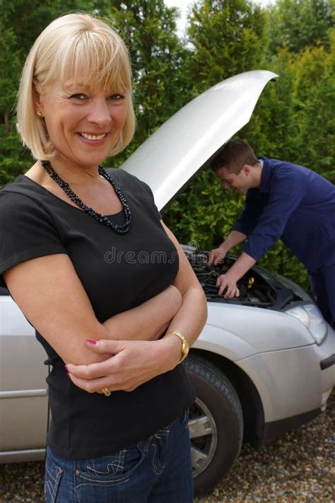 Mature Female Motorist Having Her Car Fixed Stock Photo Image Of