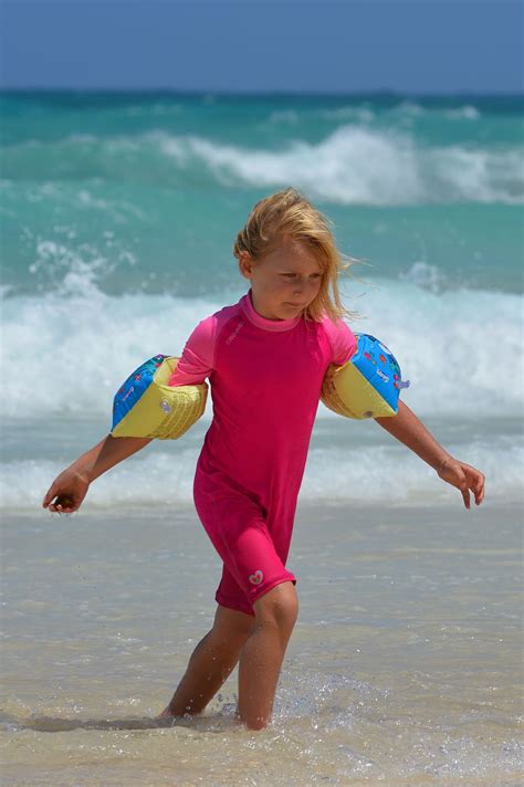 Girl Pink Wet Suit Sea Daytime Beach Rubber Rings Uv Suit