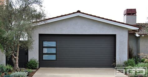 Modern Garage Door And Gate Project For An Eclectic Designed Home In