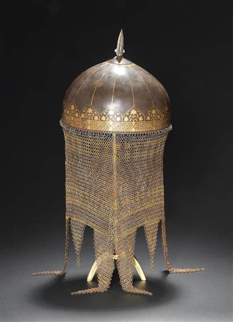 bonhams a fine safavid gold damascened steel helmet persia 17th century