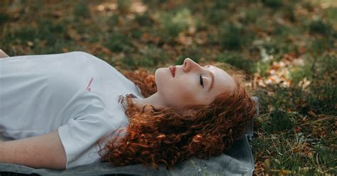 Photo Of Woman Laying On Ground · Free Stock Photo