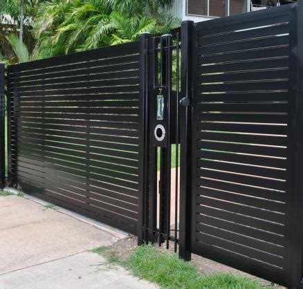 This modern gate is designed to match the house. Stallion Metal Works