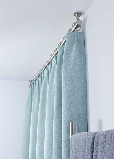 It's easy to install, but two people will be better if you want the. Bathroom Update: Ceiling Mounted Shower Curtain Rod ...