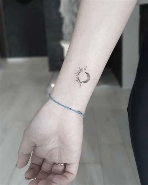 63 Most Beautiful Sun And Moon Tattoo Ideas Stayglam Moon Tattoo Wrist Tattoos For Women