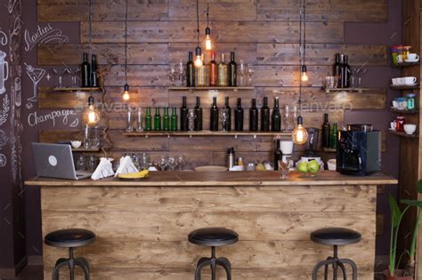 We promise you'll be skipping those thirsty thursday deals and staying home sipping on cocktails instead! Coffee shop bar counter with wine bottles Stock Photo by ...