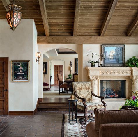 Usually asymmetrical in layout and sporting arched doorways, small balconies, curved roof tiles, stucco exterior walls. Spanish Home in Rancho Santa Fe - Mediterranean - Living ...