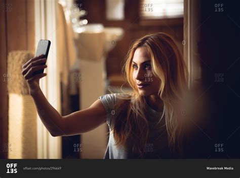 Pretty Woman Taking Selfie At Home Stock Photo Offset