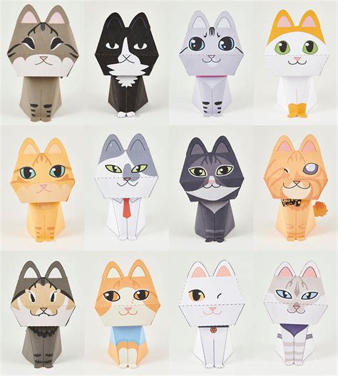 An Assortment Of Cat Paper Toys Are Shown