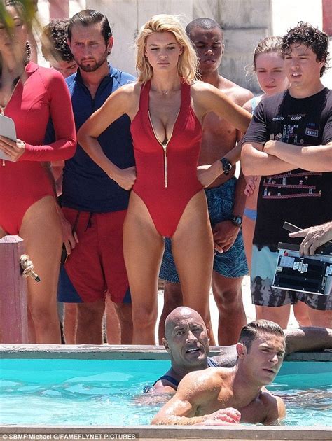 Kelly Rohrbach Showcases Her Pert Derriere In Skimpy Baywatch Bikini