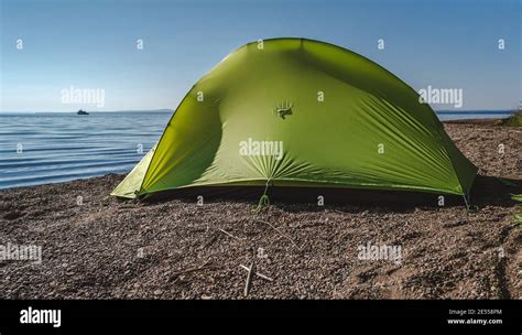Green Tent Riverside Camping Background For Adventure Stock Photo Alamy