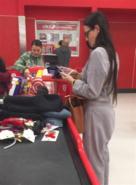 Demi Moore And Her Slave At Target For Thanksgiving Of The Day