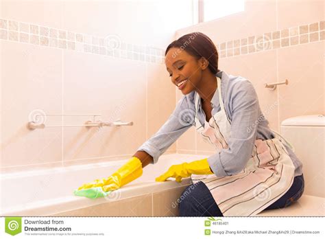 Did not receive confirmation email? Woman Cleaning Bathtub Stock Photo - Image: 46185401