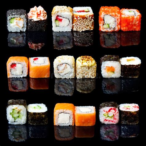 Set Traditional Fresh Japanese Sushi Rolls On A Black Background Stock