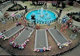 Elvis fans trek to Graceland for vigil on 34th anniversary of death ...