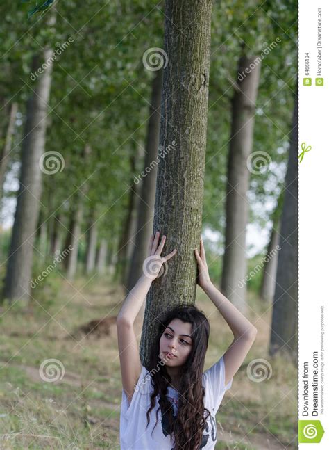 Lady Sitting Under The Tree Stock Photo Image Of Away Holding