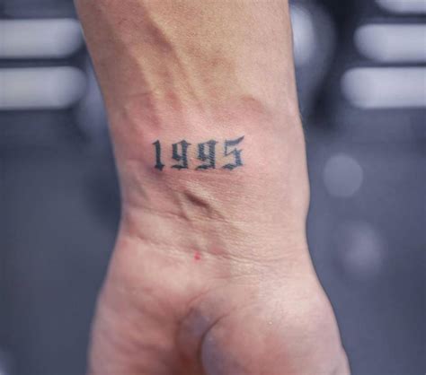 1995 Lettering Tattoo On Wrist