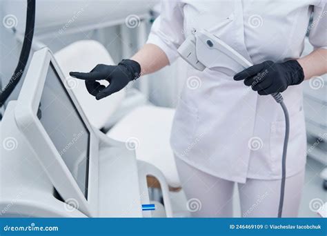 Beautician Using Ultrasound Lifting Machine In Cosmetology Clinic Stock
