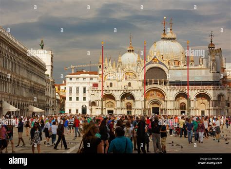 Tourists Visit San Marco Square In Venice They Take Pictures And Selfie And Enjoy With The