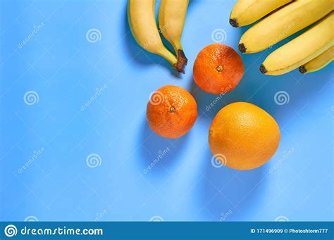 Scattered Different Fruits Bunch Of Fresh Ripe Bananas Oranges