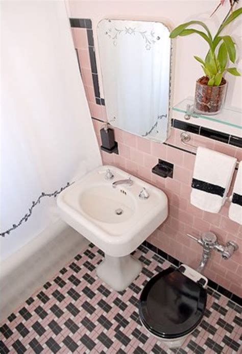 The floor is so striking in both color and the basketweave pattern, it almost looks like an optical illusion. Pink retro bathroom | Retro bathrooms, Pink bathroom ...