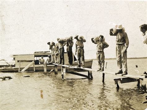 Florida Memory Postcard Showing Koreshans Taking Produce Off Mound