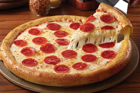 Chuck E Cheeses Celebrates National Pizza Day With Its Cheesiest
