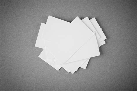 Premium Photo Blank Paper Cards For Branding On Grey Background