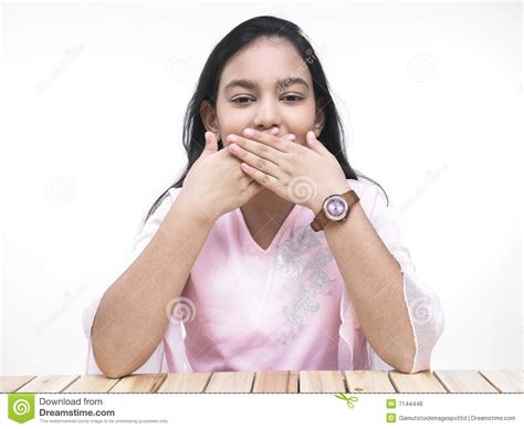 Asian Teenage Girl Covering Her Mouth Royalty Free Stock