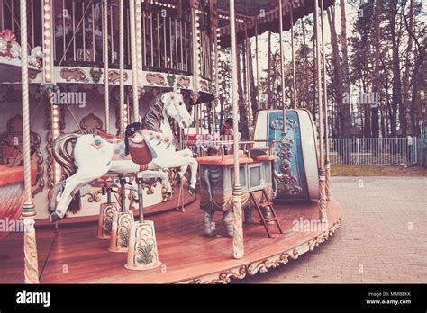 Outdoor Vintage Flying Horse Carousel In The City Beautiful Bright