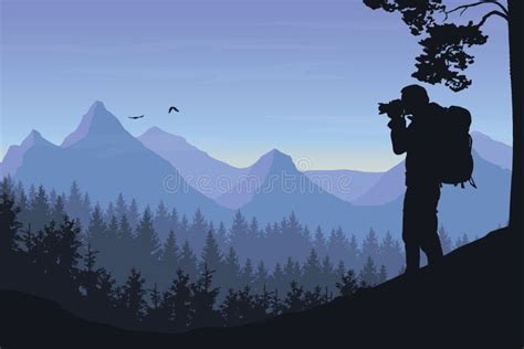 Tourist Photographing A Flying Bird In A Mountain Landscape Wi Stock