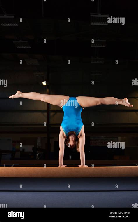Gymnast Doing Handstand With Legs Split Stock Photo Alamy