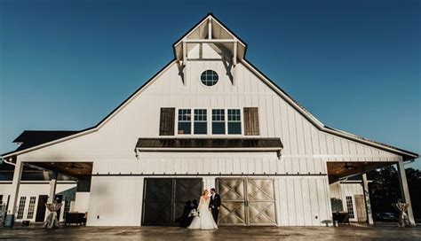 Bride And Groom Wedding Portrait Black Doors And White Barn The