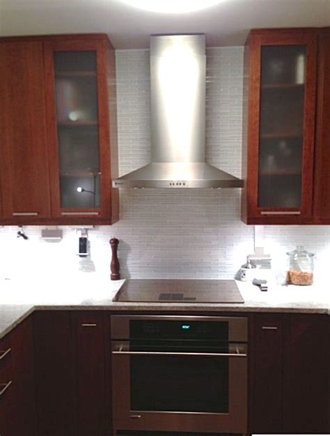 Appliances make the kitchen go round. New York City Kitchen with stainless steel appliances ...