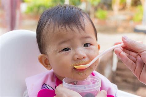 Asian Cute Baby Eating Food Stock Photo Image Of Home Care 93006686