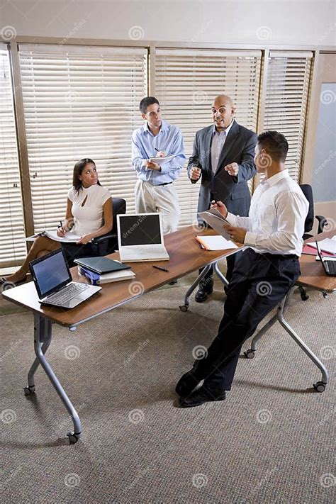 Manager Meeting With Office Workers Directing Stock Photo Image Of