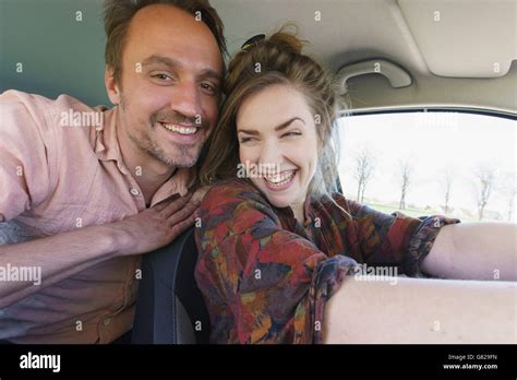 Happy Man Enjoying With Woman Driving Car Stock Photo Alamy
