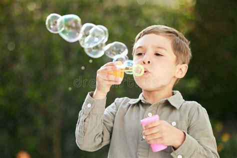 Give A Child Bubbles And Theyll Be Entertained An Adorable Little Boy