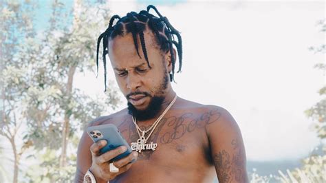 Popcaan 2023 Dating Net Worth Tattoos Smoking And Body Facts Taddlr