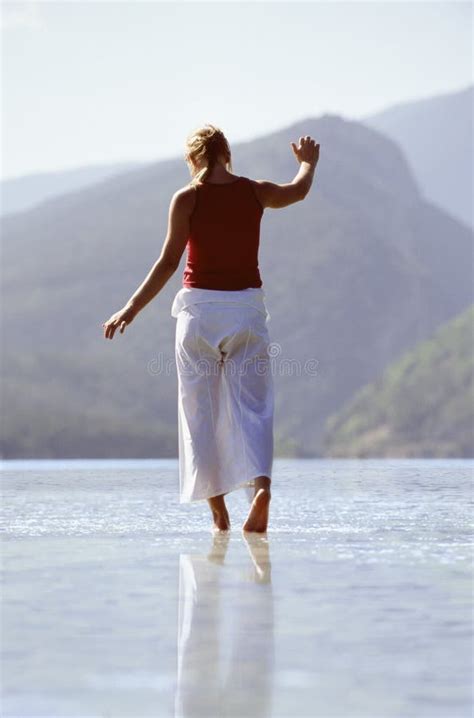 Woman Wading In Pond Stock Image Image Of Play Emotion 5489329