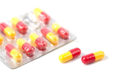 Red And Yellow Capsule Pills In Blister Isolated Picture Image 10312614