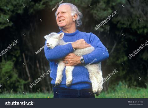 Man Holding Lamb Images Stock Photos And Vectors Shutterstock